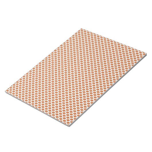 Bloc-note un motif géométrique orange et blanc (Incliné)