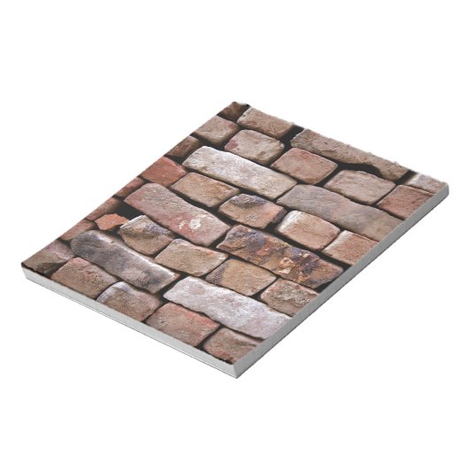 Bloc-note Un regard plus proche sur un mur en brique (Tourné)