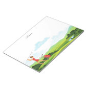 Bloc-note Une golfeuse en rouge sur vert (Incliné)