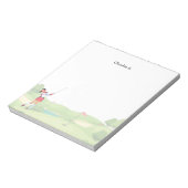 Bloc-note Une golfeuse joue sur le parcours (Tourné)