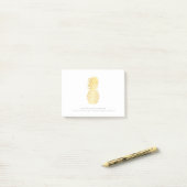 Bloc - notes de notes de post-it - ananas d'or (Sur un bureau)