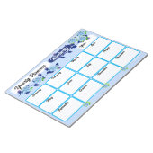 Bloc-notes du planificateur annuel des fleurs bleu (Incliné)