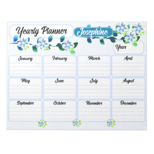 Bloc-notes du planificateur annuel des fleurs bleu