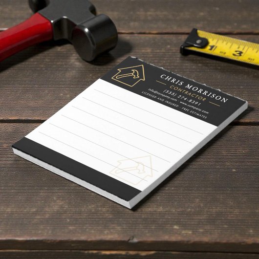 Bloc-notes noir or de l'entreprise de construction