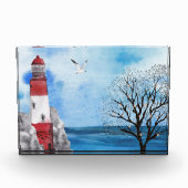 Bloc Photo Couleur d'eau marine du phare rouge et blanc (Devant)
