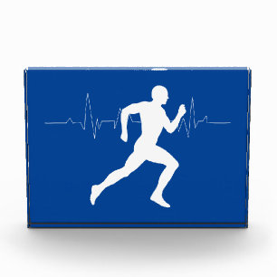 Bloc Photo Homme coureurs Silhouette sur Arrière - plan bleu