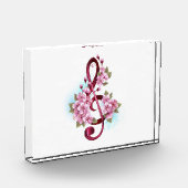 Bloc Photo Musical treble clef notes with sakura flowers (Gauche)
