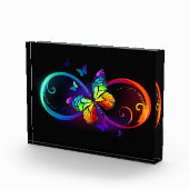 Bloc Photo Vibrant infinity with rainbow butterfly on black (Droite)
