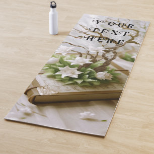 Bloeiende boom groeien uit een aangepaste boek yogamat