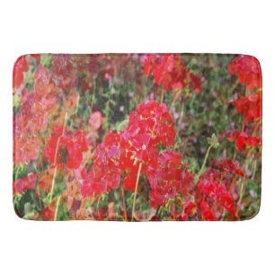 Bloeiende geraniums.... badmat