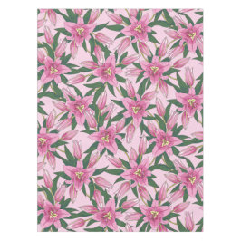 Bloeiende lelies in pastelroze tafelkleed