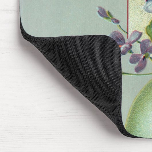 bloeiende paarse bloemen in een paasei muismat (Hoek)