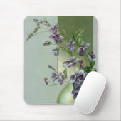 bloeiende paarse bloemen in een paasei muismat (Met muis)