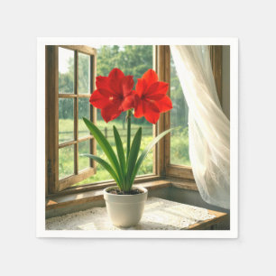 Bloeiende rode amaryllis in zonnig raam servet