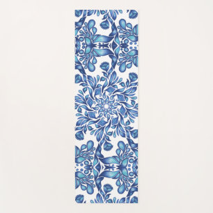 Bloem- en bladmandala in blauwvintonijn yogamat