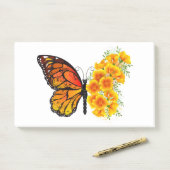 Bloem vlinder met gele Californische pap Post-it® Notes (Op bureau)