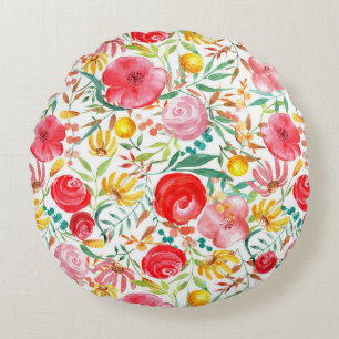 Bloemen in stijl en weidegras rond kussen