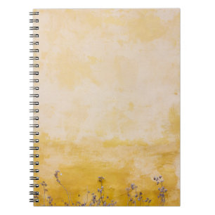 Bloemen naast gele wand notitieboek