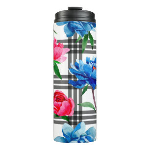Bloemen van rode en blauwe pinda's in de bloemente thermosbeker