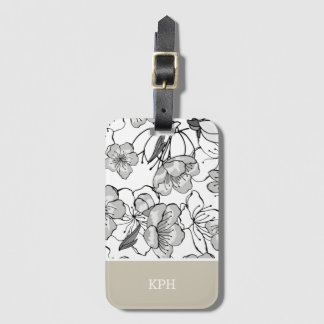 Bloemig zwart, wit en bruin met monogram bagagelabel