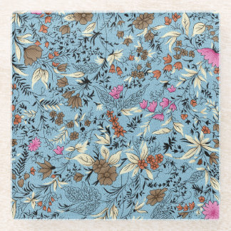  bloemmotief, blauwe achtergrond. glazen onderzetter