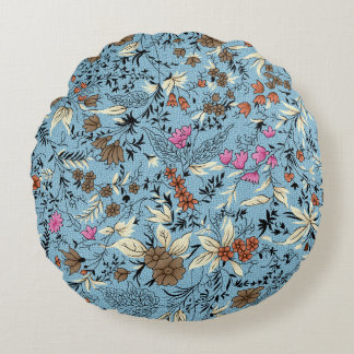  bloemmotief, blauwe achtergrond. rond kussen