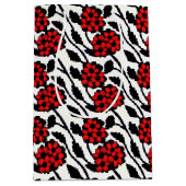  bloemmotief in rood, zwart en wit medium cadeauzakje (Voorkant)