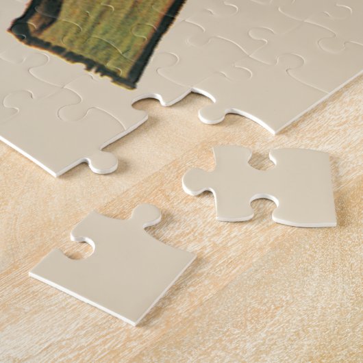  blond meisje met een kinderongeluk dat telefonisc legpuzzel (Zijkant)