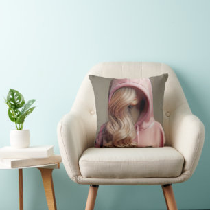 Blond tienermeisje in een roze hoodie kussen