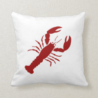 BLOSTER rouge sur coussin blanc