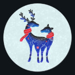 Blue Nordic Christmas Reindeer Pair<br><div class="desc">Un autocollant avec un arrière - plan vert clair et blanc à l'allure enneigée. Illustré par une paire de cerfs bleus scandinaves portant des foulards rouges. Avec des marquages décoratifs sur le corps.</div>