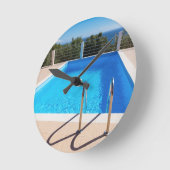 Blue swimming pool with steps at sea ronde klok (Hoek)