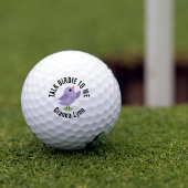 Bluebird over het zetten van groene monogrammen golfballen