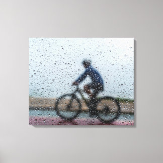 Blurred Cyclist Through Rainy Window Canvas Afdruk