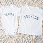 Body Enfants Nom personnalisé Tee | Dusty Blue<br><div class="desc">Ces t-shirts personnalisés pour enfants présentent le nom de votre enfant ou tout autre texte personnalisé dans une police voûtée moderne et élégante, ajoutant une touche ludique et unique à leur garde-robe. Fabriqués en tissu doux et de haute qualité, ces tee - shirts personnalisés sont parfaits pour l'usure quotidienne, les...</div>