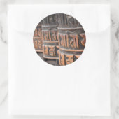 Boeddhistische gebedsmolen rond de sticker (Tas)