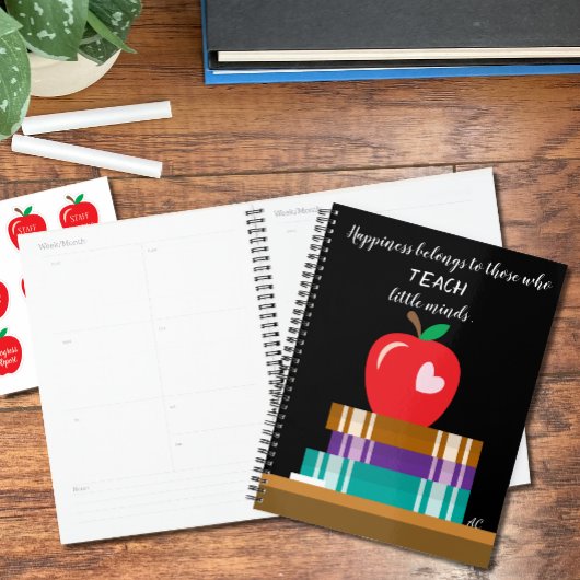 Boeken, rode Apple en Quote Teacher Planner