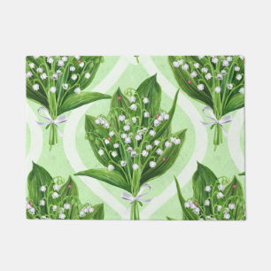 Boeket van lelie van de vallei bloemen op groen deurmat