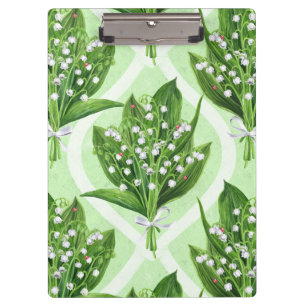 Boeket van lelie van de vallei bloemen op groen klembord