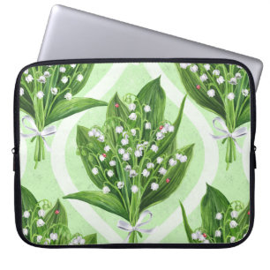 Boeket van lelie van de vallei bloemen op groen laptop sleeve