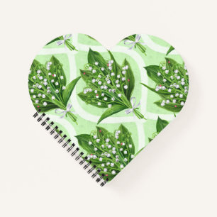 Boeket van lelie van de vallei bloemen op groen notitieboek