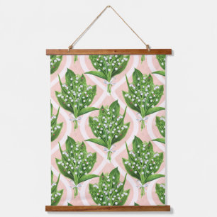 Boeket van lelie van de vallei bloemen op roze hangend wandkleed