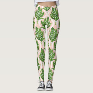 Boeket van lelie van de vallei bloemen op roze leggings