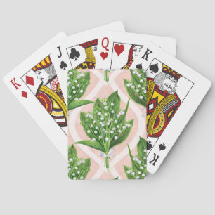 Boeket van lelie van de vallei bloemen op roze pokerkaarten