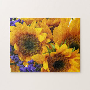 Boeket van zonnebloemen en paarse statice legpuzzel