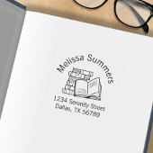 Boekstapel en geopend adresboek ex-libris 	rubberstempel