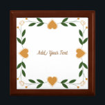 Boîte À Souvenirs Flore Élégante Avec Coeurs Or Mariage Personnalisé<br><div class="desc">Personnalisez ce joli et élégant Floral avec Golden Hearts Mariage Bijoux Keepsaké design boîte. Vous pouvez ajouter du texte, du nom, etc. si nécessaire. Vous pouvez également modifier le modèle de police, la couleur de police et la taille de police si vous le souhaitez. Cliquez sur —> "Personnaliser" pour trouver...</div>