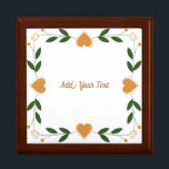 Boîte À Souvenirs Flore Élégante Avec Coeurs Or Mariage Personnalisé<br><div class="desc">Personnalisez ce joli et élégant Floral avec Golden Hearts Mariage Bijoux Keepsaké design boîte. Vous pouvez ajouter du texte, du nom, etc. si nécessaire. Vous pouvez également modifier le modèle de police, la couleur de police et la taille de police si vous le souhaitez. Cliquez sur —> "Personnaliser" pour trouver...</div>