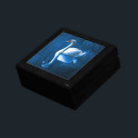Boîte À Souvenirs Pretty white swan floating on blue lake<br><div class="desc">A lovely nature scene of a white swan swimming on a peaceful blue lake. The dark blue shadows contrasts nicely with the soft blue lighting on this peaceful swan.</div>