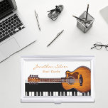 Boîtier Pour Cartes De Visite Guitare acoustique Piano Keys professeur de musiqu<br><div class="desc">Apparaissez plus professionnel et gardez vos cartes de visite en parfait état en même temps avec cet élégant coque carte de visite moderne noir et blanc avec guitare et touches de piano pour ceux dont la passion ou / et la profession est la musique. Idéal pour les professeurs de musique,...</div>